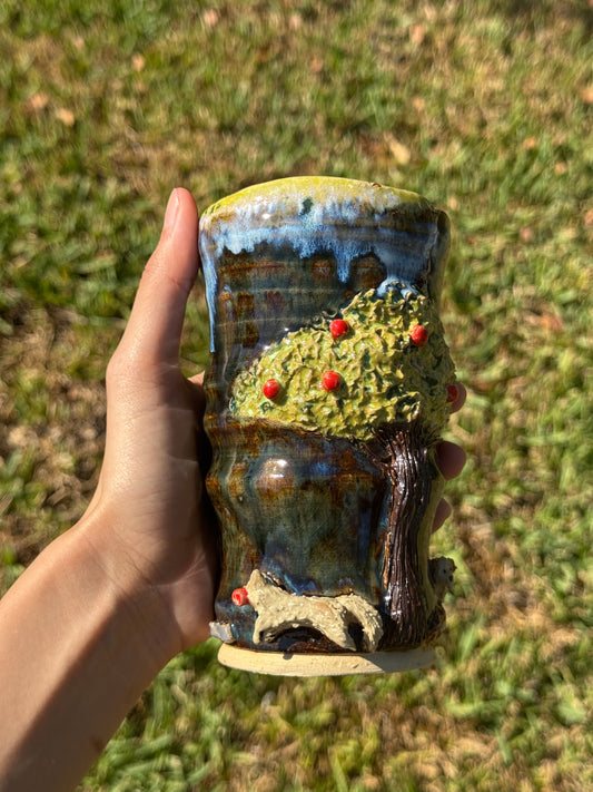 The dog by the apple tree