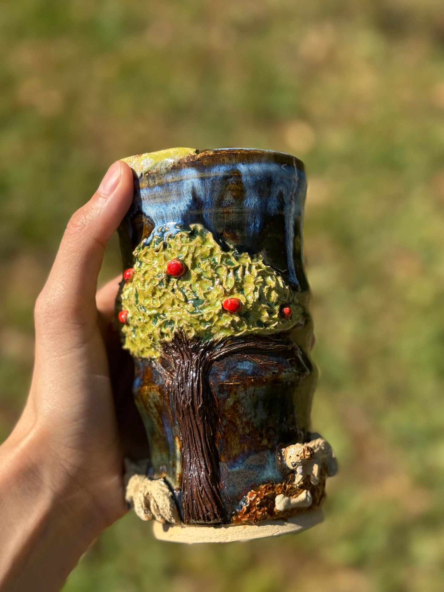 The dog by the apple tree