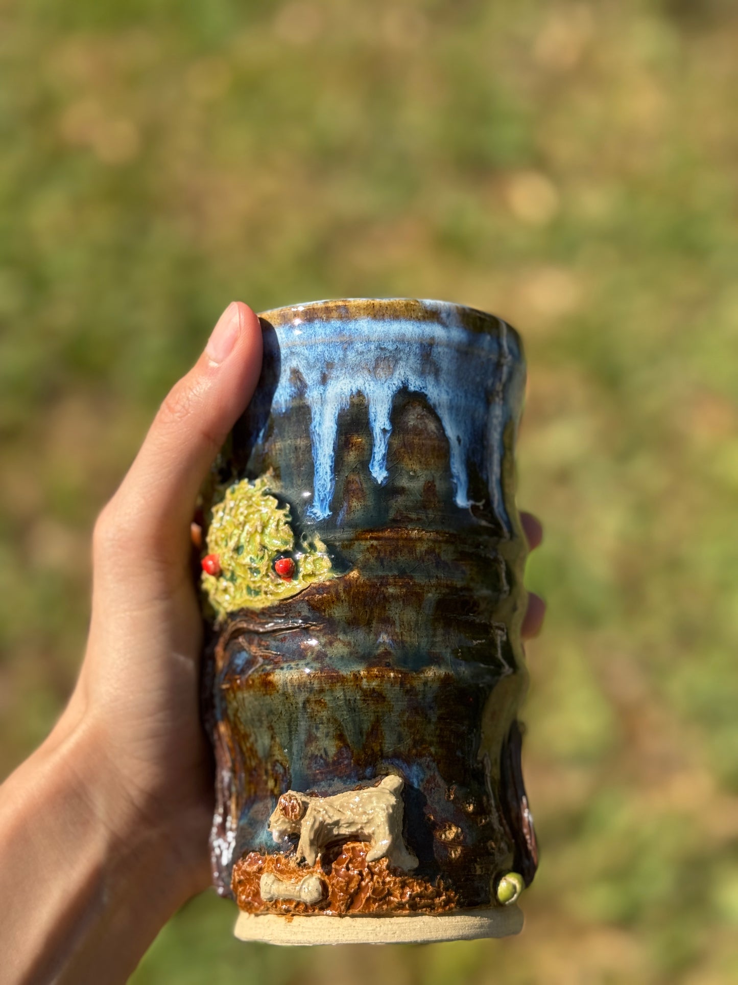 The dog by the apple tree