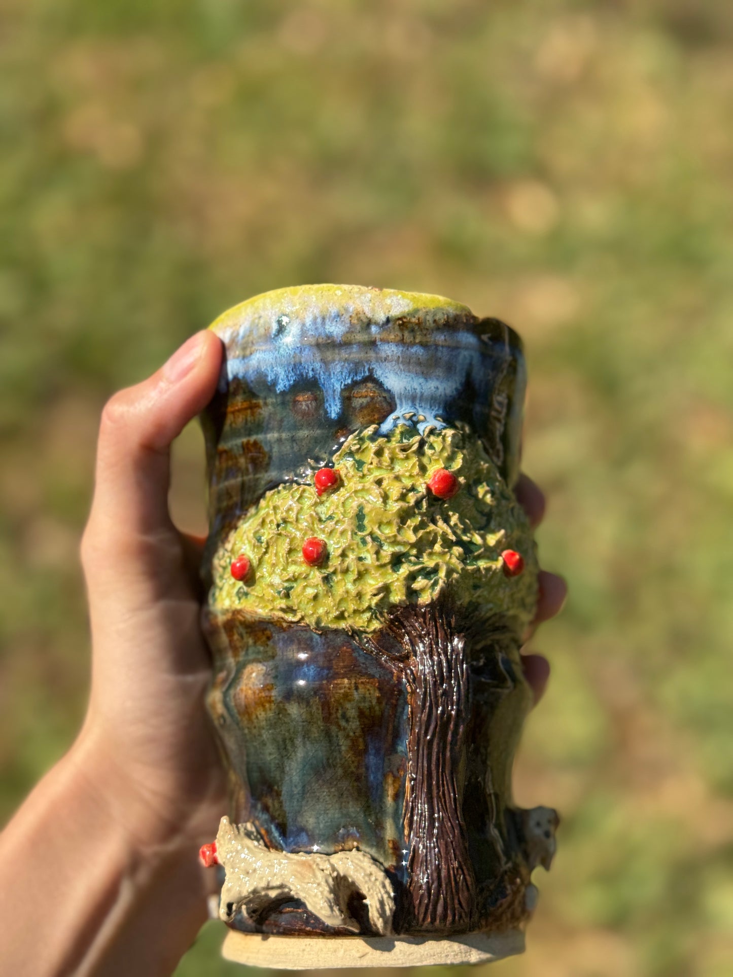 The dog by the apple tree